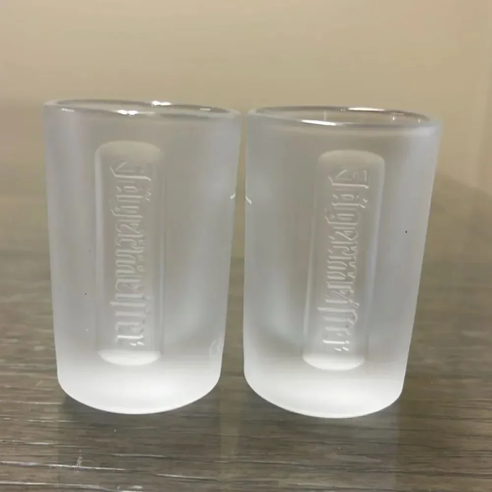 Pair of Embossed Jagermeister Frosted Glass 1 fl. oz Shot Glasses Barware Bar